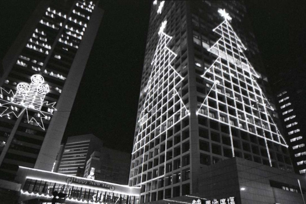 Christmas lights adorn the exterior of The Landmark in Central in 1980, soon after it opened.