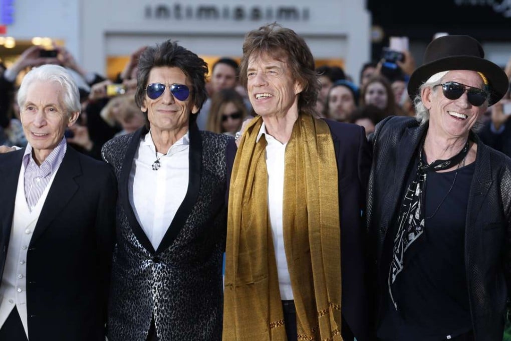 The Rolling Stones (from left) Charlie Watts, Ronnie Wood, Mick Jagger and Keith Richards arrive for the Exhibitionism opening night gala at the Saatchi Gallery in London on April 4. Photo: Reuters