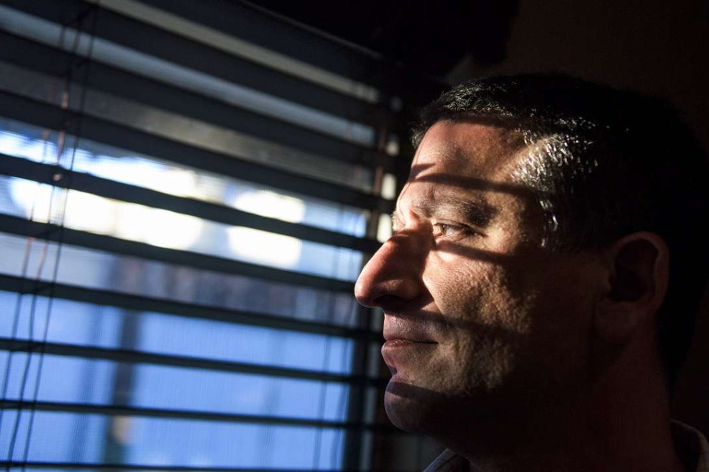 Keith Gartenlaub in his home in Southern California. An espionage investigation led to Gartenlaub being convicted of the possession of child pornography, which he denies. Photo: Washington Post .