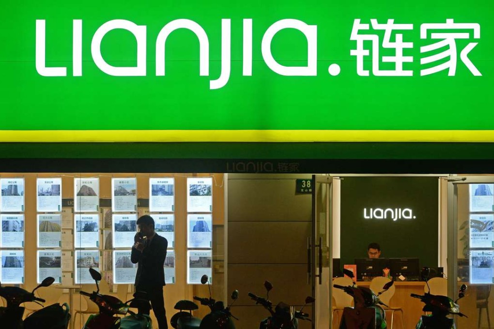 Advertisements posted on the windows of a shop of Lianjia, China's biggest real estate brokerage agency, in Shanghai; Photo Lai Xinlin