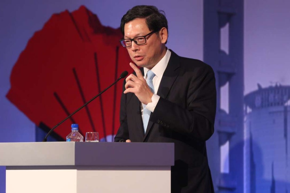 Monetary Authority chief executive Norman Chan delivers the keynote address at the forum on Thursday. Photo: Nora Tam