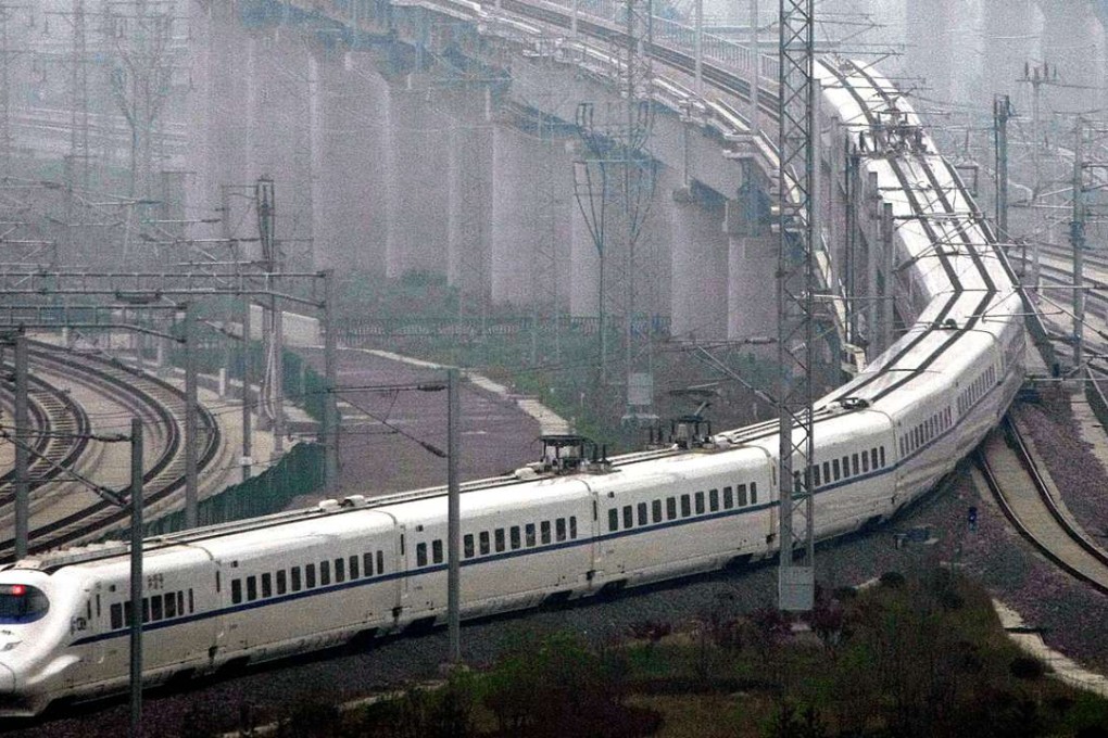 A train which can run at speeds up to 300 kilometres (185 miles) per hour goes on a trial run in Shanghai on May 11, 2011. Trial runs began on the highly anticipated high-speed rail line between Beijing and Shanghai, one month before the link is due to go into commercial service, state media reported. CHINA OUT AFP PHOTO