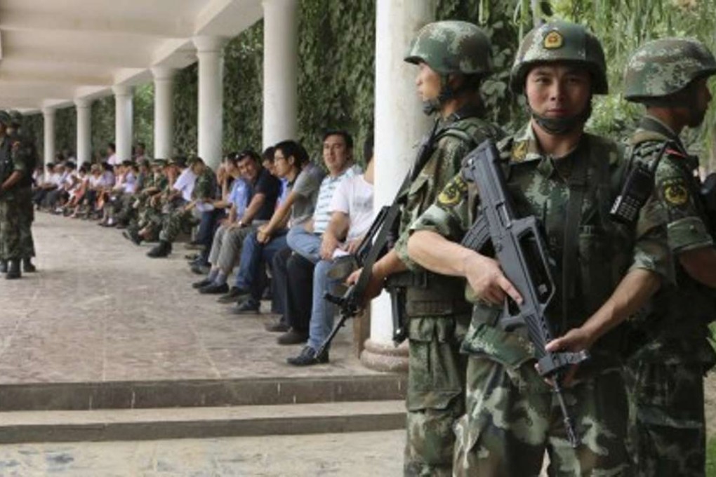 A file picture of security forces on guard in restive Xinjiang province in China where hundreds have died in attacks blamed on Islamic militants in recent years. Photo: Reuters