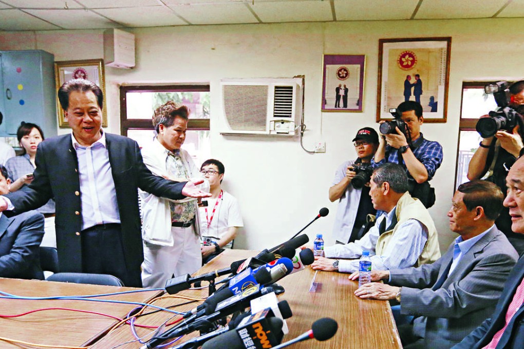 Bowie Hau (left) makes a point at the meeting of rural committee representatives. Photo: Sam Tsang