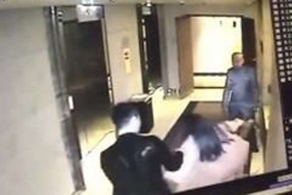 CCTV footage shows the woman struggling with an attacker as a hotel employee looks on in the corridor of Yitel Hotel in Beijing. Photo: SCMP Pictures