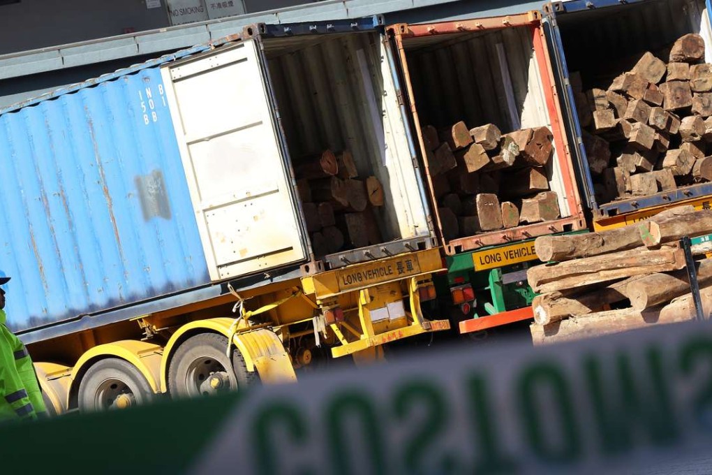 Hong Kong customs foiled the smuggling of four containers of endangered Honduras rosewood in 2014. The 92 tonnes of logs were valued at about HK$3 million. Photo: Nora Tam