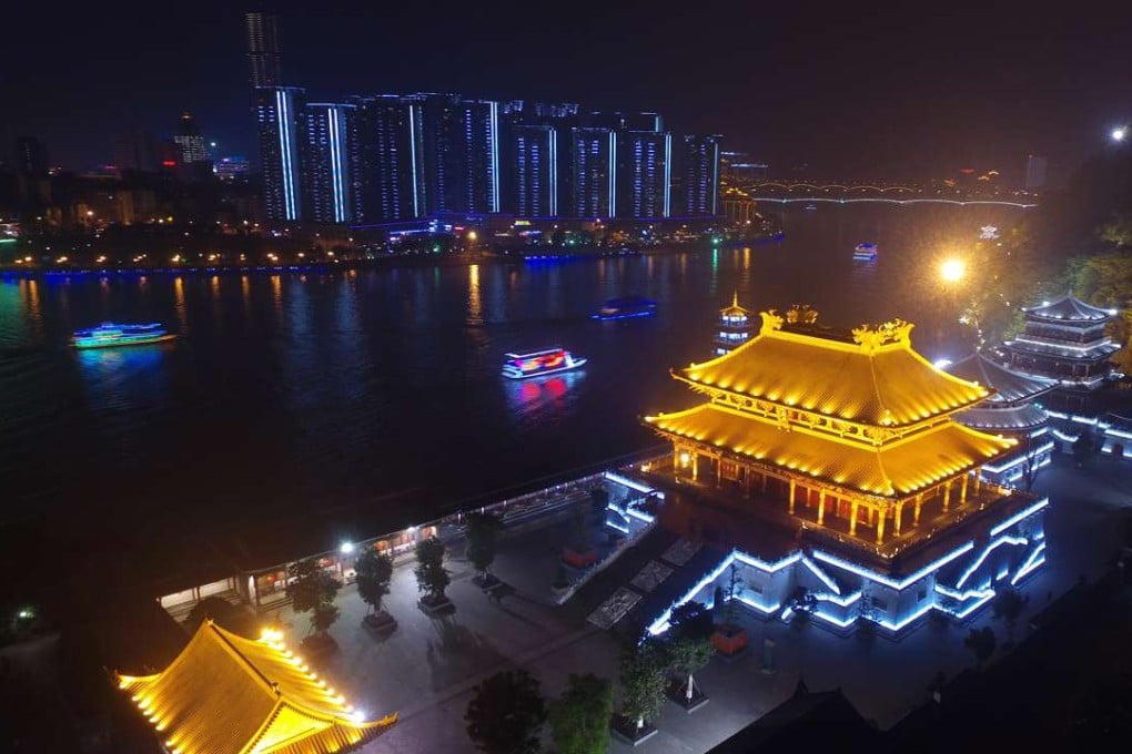 The Liujiang River in Liuzhou City by night. It is in south China's Guangxi Zhuang Autonomous Region. The City has intensified its efforts in making a scenic belt along the Liujiang River to boost tourism. Photo: Xinhua, Li Bin