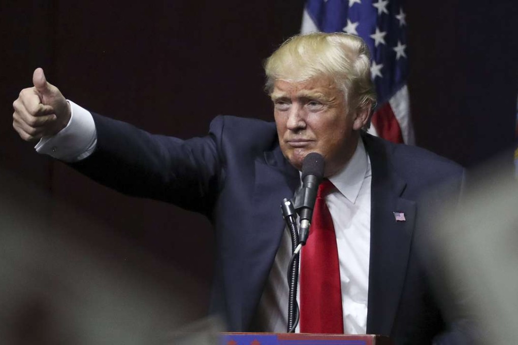 U.S. Republican presidential candidate Donald Trump speaks on stage during campaign event at Grumman Studios in Bethpage, New York on April 6, 2016. Photo: Reuters