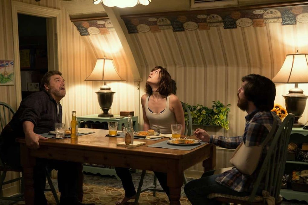 From left: John Goodman, Mary Elizabeth Winstead and John Gallagher Jnr in a still from 10 Cloverfield Lane. Photos: AP