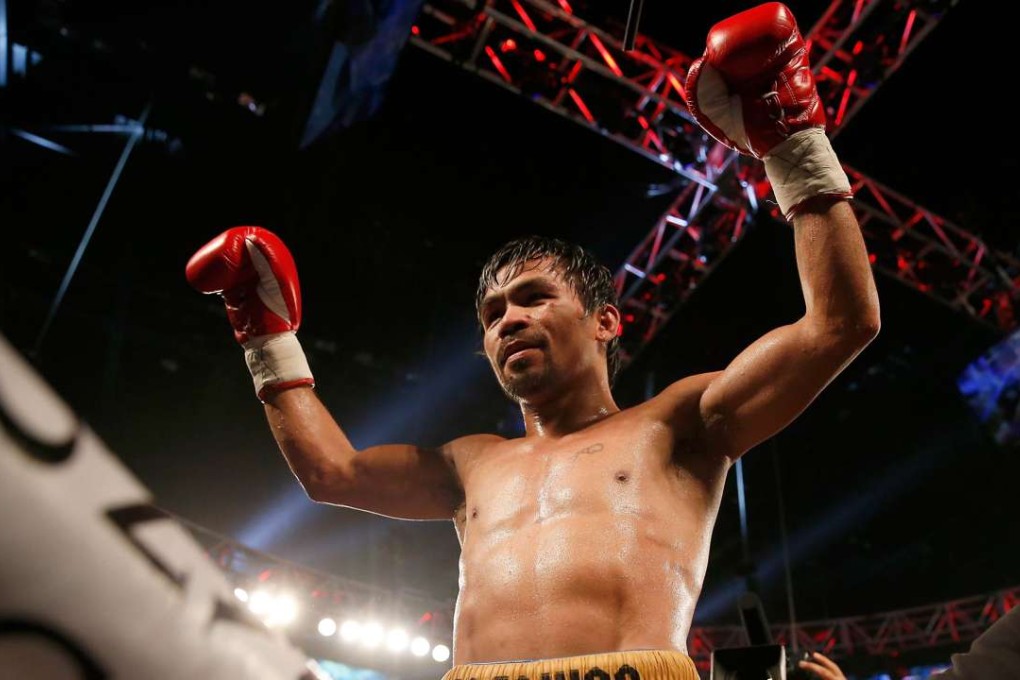 Manny Pacquiao celebrates after defeating Timothy Bradley Jnr by unanimous decision in Las Vegas, Nevada. Photo: AFP