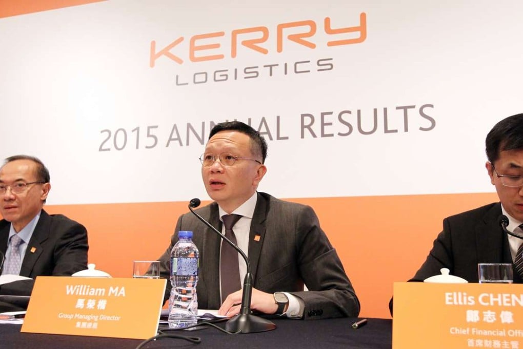 Kerry Logistics managing director William Ma (centre) at its results announcement last month. Photo: Bruce Yan