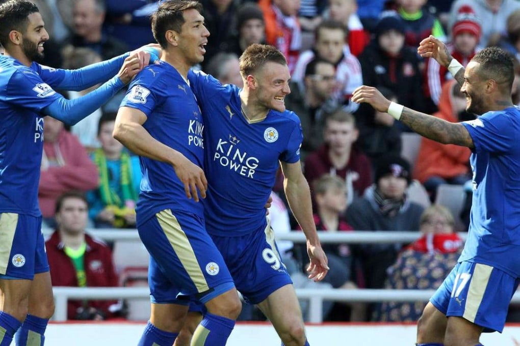 Leicester City’s English striker Jamie Vardy, who is smiling like a Chesire cat, celebrates scoring his team’s first goal. Photo: AFP