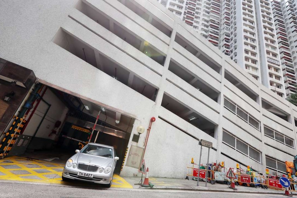 A car leaves the car park at a private residential development in Tai Hang. Photo: Nora Tam