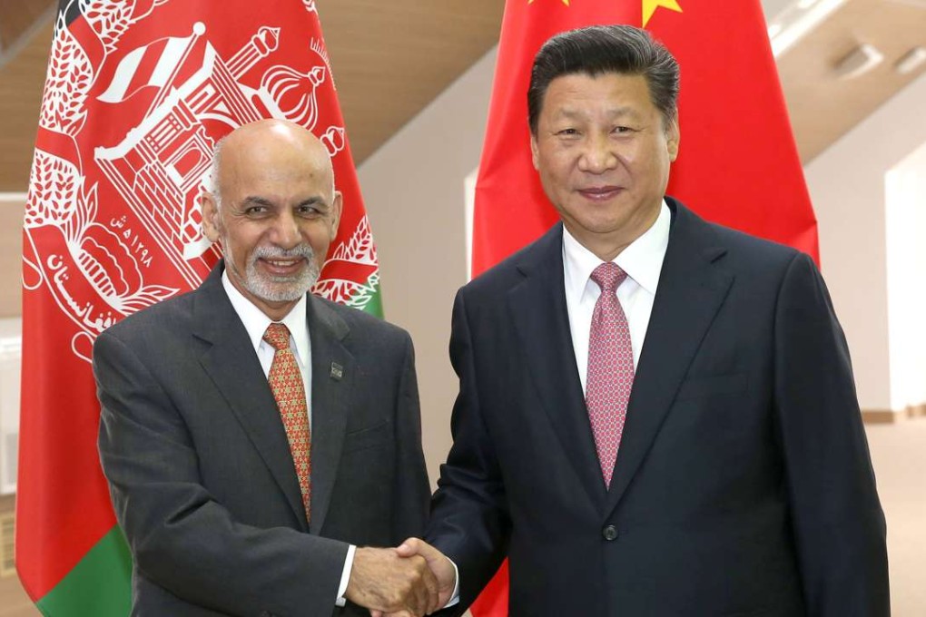 A file photo of Chinese President Xi Jinping (right) with his Afghan counterpart Ashraf Ghani . Photo: Xinhua