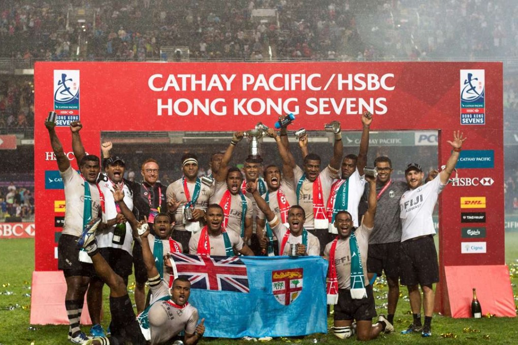 Fiji players celebrate after winning the Sevens. Photo: EPA