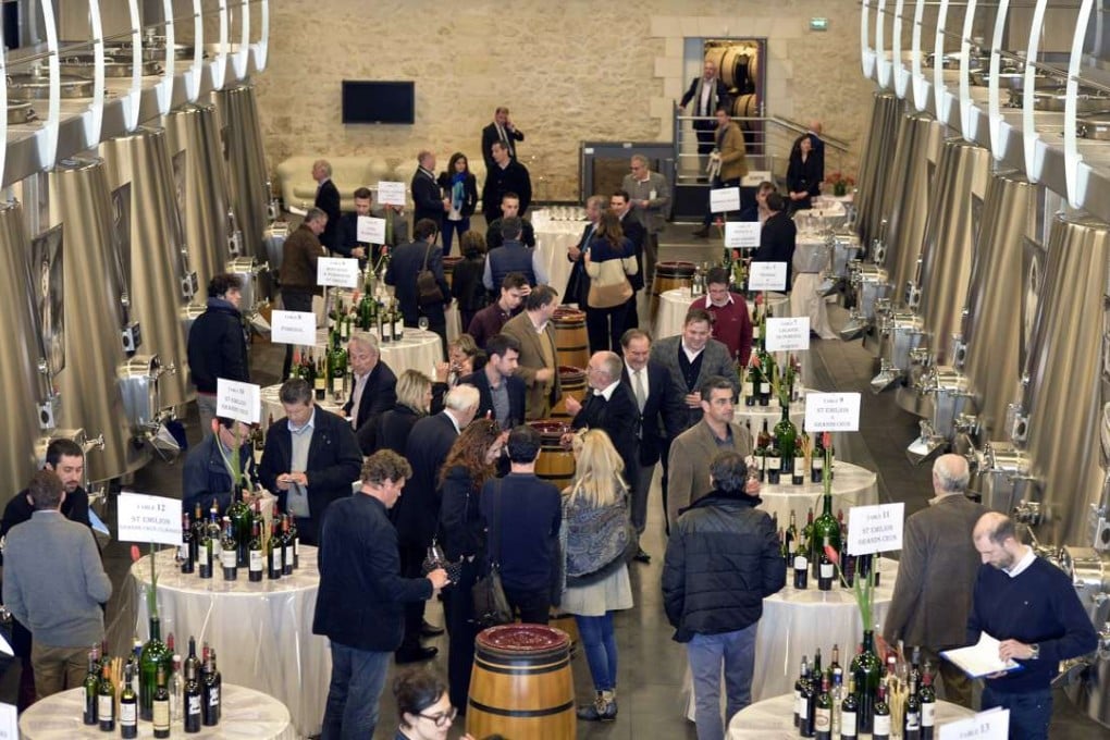Wine professionals at the en primeur in Bordeaux. Photos: AFP
