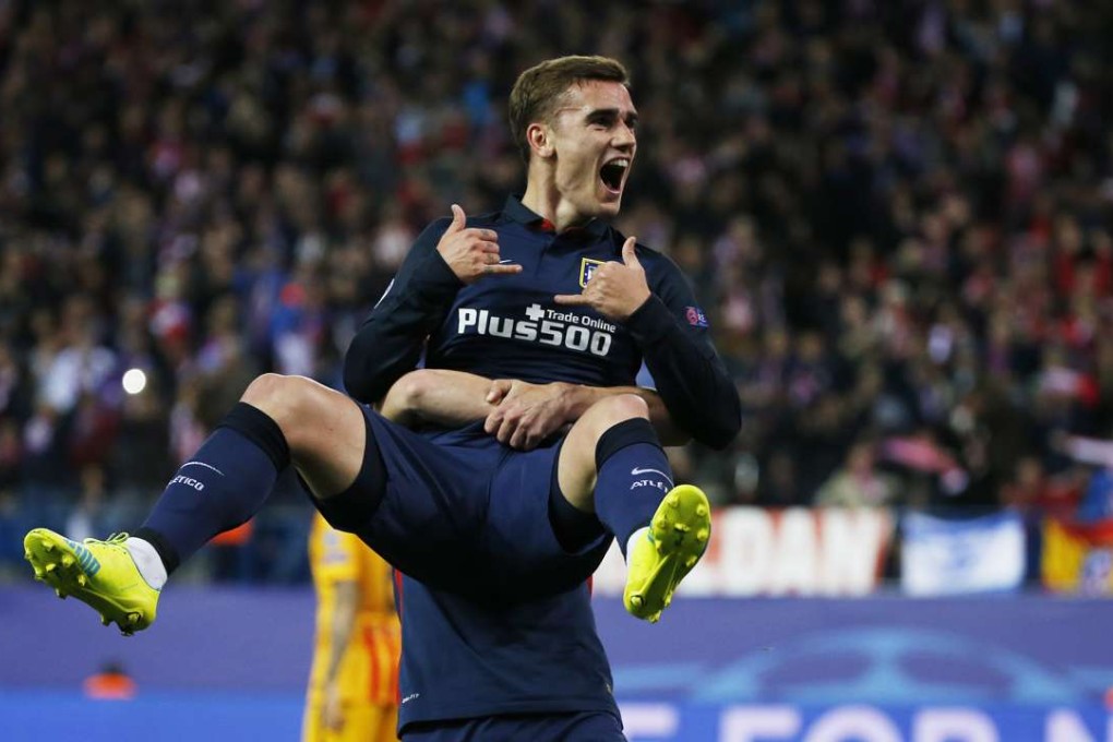 Antoine Griezmann celebrates scoring Atletico’s first goal. Photo: Reuters