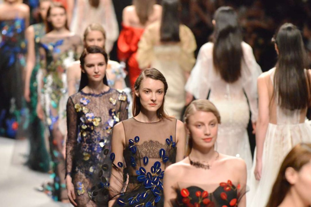 Looks from We Couture’s autumn-winter 2016 collection at Shanghai Fashion Week.. Photos: Xinhua