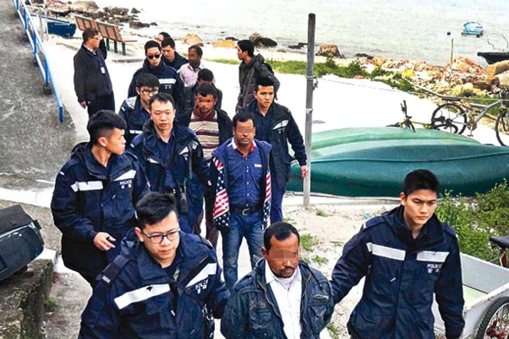 Hong Kong police arrest South Asian asylum seekers. The vast majority of illegal immigrants are from Vietnam, but both the government and media are focused on those from the subcontinent. Photo: SCMP Pictures