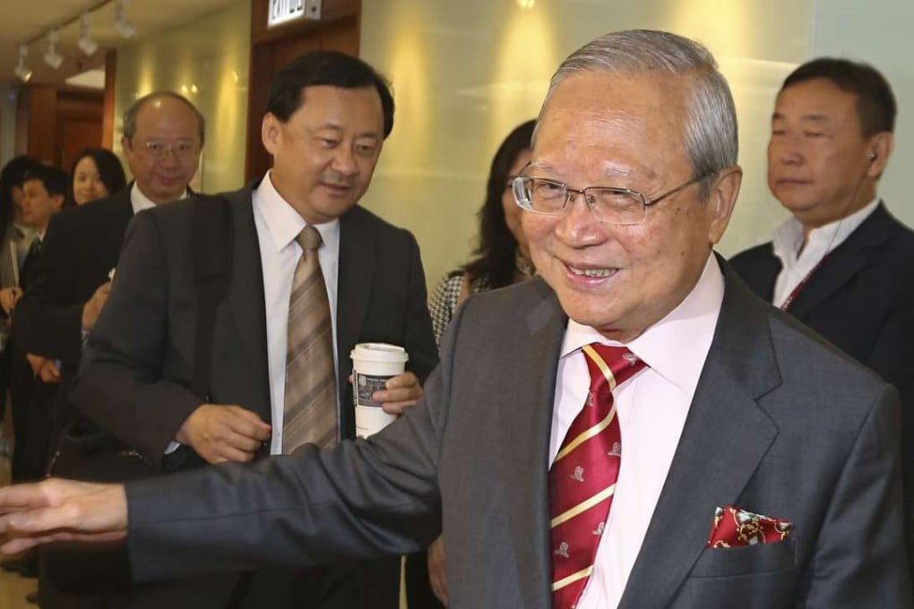 Former TVB executive chairman Norman Leung Nai-pang attends the Chinese University of Hong Kong Council meeting at the Bank of American Tower in Central. Photo: David Wong