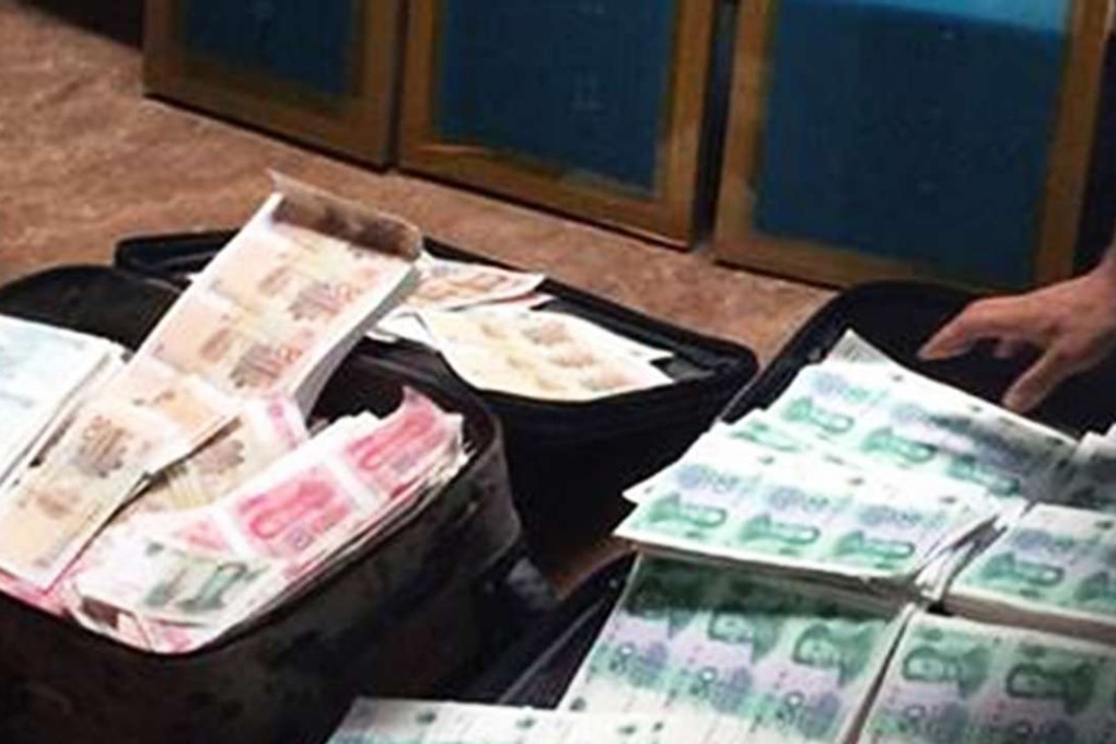 Up to 80 per cent of the smaller denomination counterfeit banknotes could not be detected by shopkeepers. Photo: SCMP Pictures