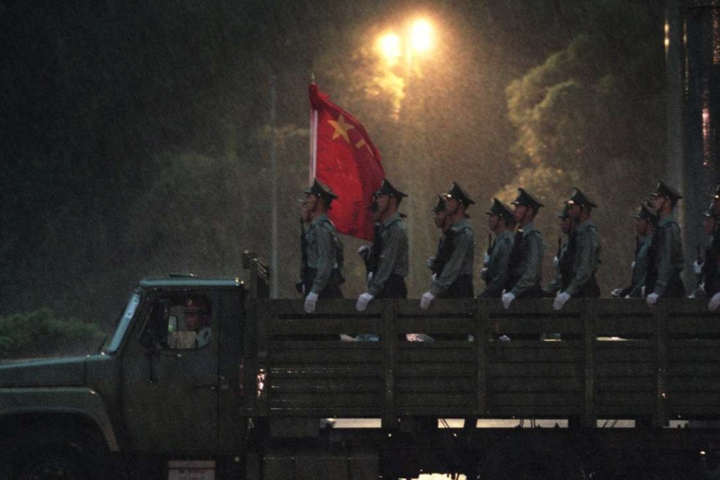 PLA troops crossing the border into Hong Kong in the early hours of July 1 1997. Photo: SCMP Pictures