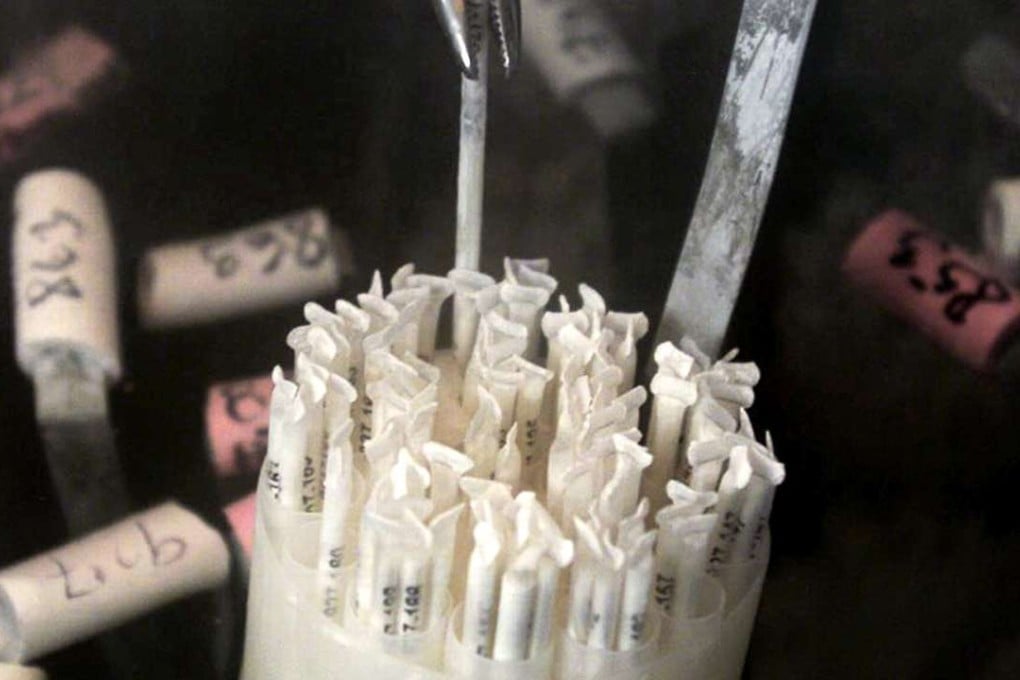 Frozen human sperm is extracted from a storage facility. Photo: AFP