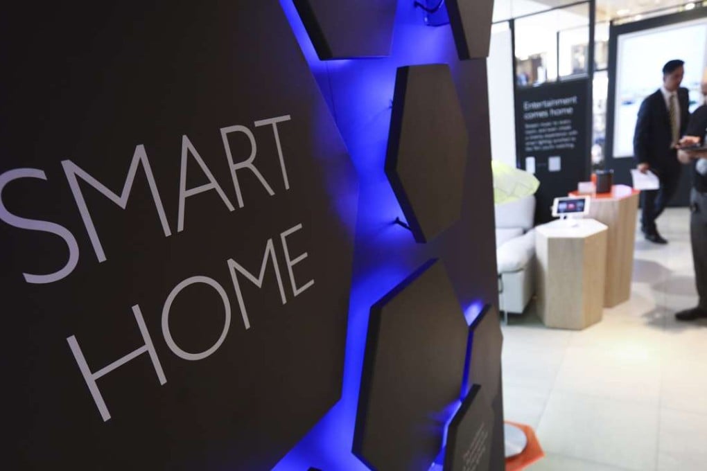 A sign hangs from the wall inside the Smart Home section at a John Lewis Plc department store in London. Photo: Bloomberg
