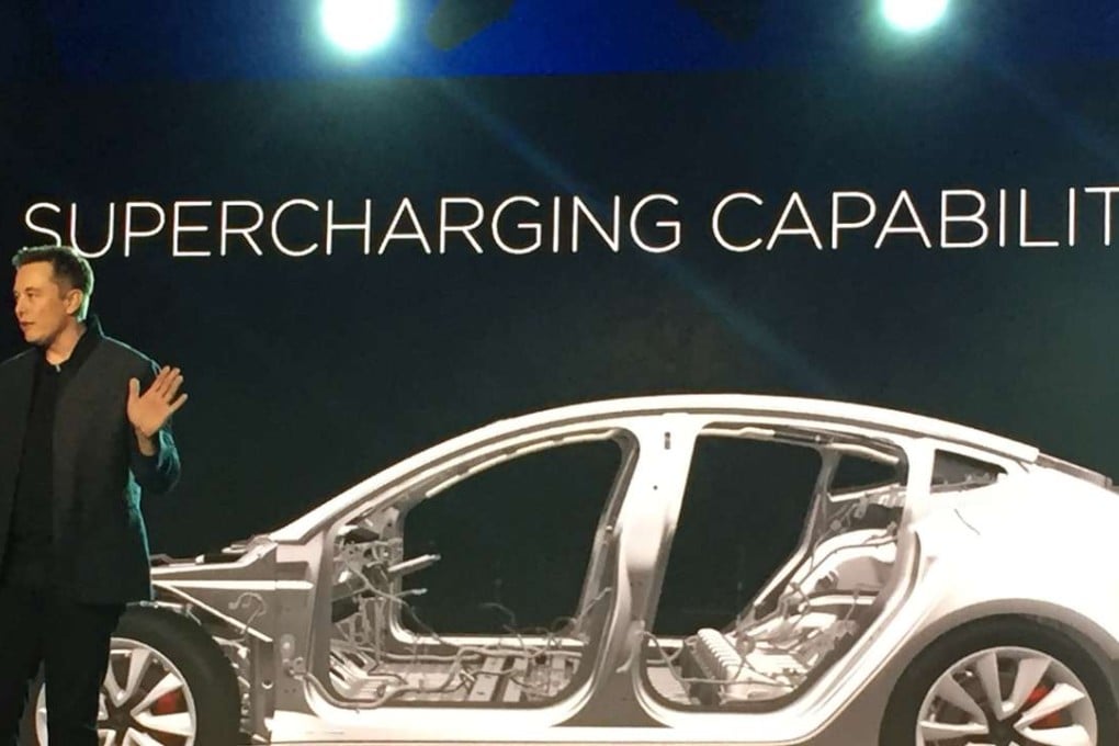 Tesla Motors CEO Elon Musk speaks at the unveiling of the Model 3 at the Tesla Motors design studio in Hawthorne, California. More than 276,000 people pre-order the Tesla Model 3 in less than a week of its launch. Is it the “Tesla phenomenon,” or has the $35,000 electric car with a range of 200-plus miles taken finally taken the electric car to the masses. Photo: AP