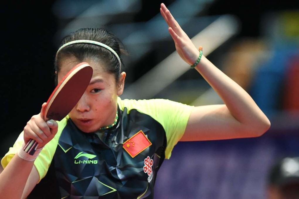Li Xiaoxia of China returns the ball during the women's singles final match against Ishikawa Kasumi of Japan at the Asian Table Tennis Qualification Tournament for the 2016 Rio Olympic Games at the Queen Elizabeth Stadium in Hong Kong. Photo: AFP