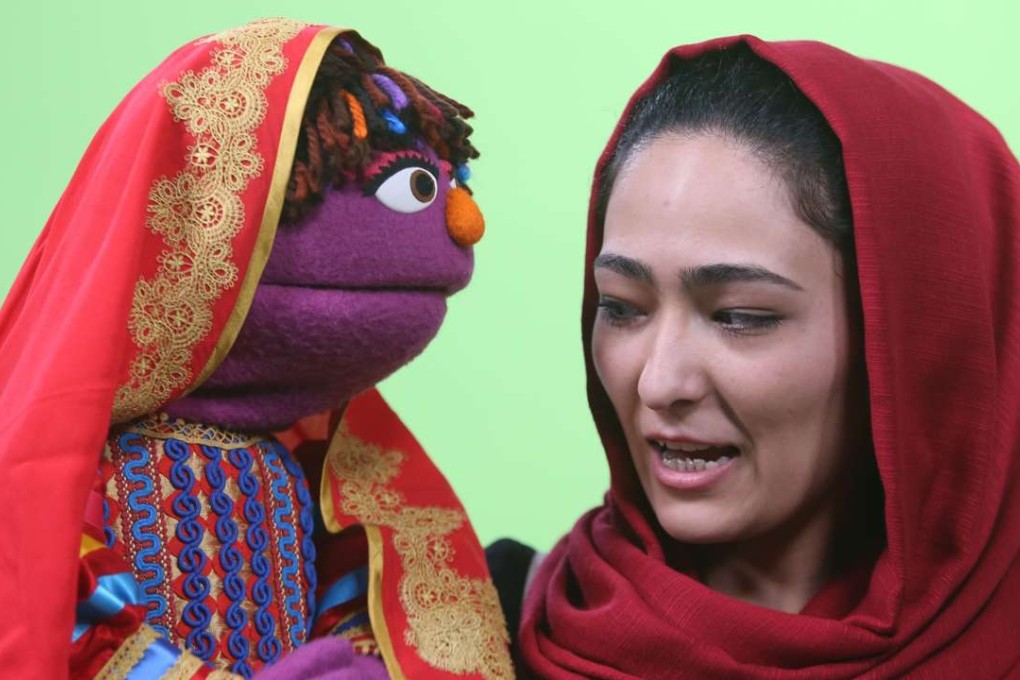 Afghan puppeteer Mansoora Shirzad with Sesame Street's new character, Zari. Photo: AP