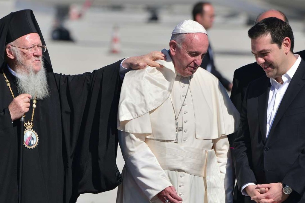 Pope Francis (centre) with Greek Prime Minister Alexis Tsipras (right) and Bartholomew I of Constantinople, Archbishop of Constantinople. Photo: AFP