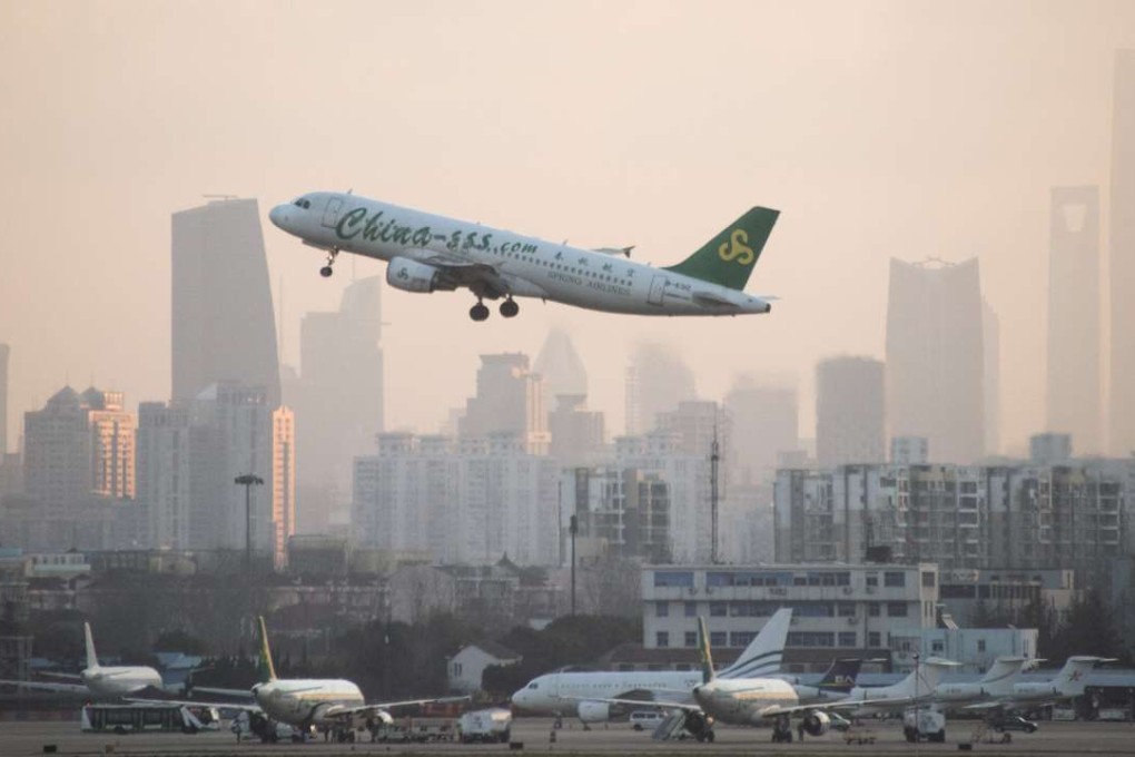 A plane from Chinese airline Spring Airlines departs from Hongqiaou Airport in Shanghai. Photo: AFP