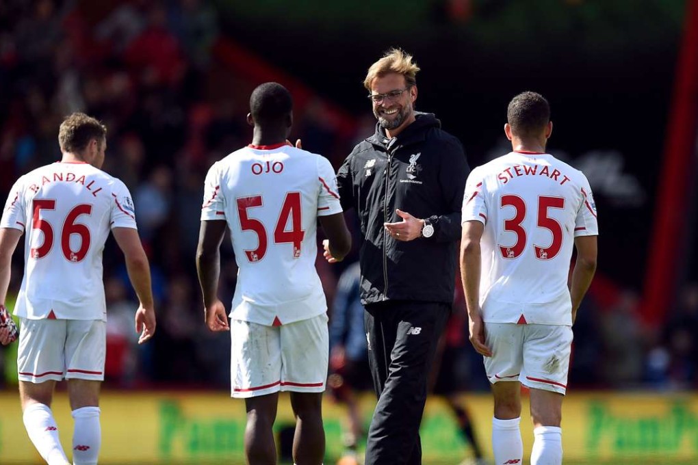 Juergen Klopp celebrates after a youthful Liverpool team got the three points against Bournemouth. Photo: AP