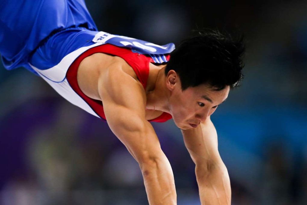 Hong Kong’s Shek Wai-hung vaults to gold at the 2014 Asian Games in Incheon. Photo: Xinhua