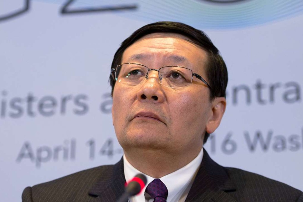 China's finance minister Lou Jiwei responds to a question from the news media during the G20 press conference following the G20 meeting at the International Monetary Fund (IMF) Headquarters in Washington, DC, USA. Photo: EPA