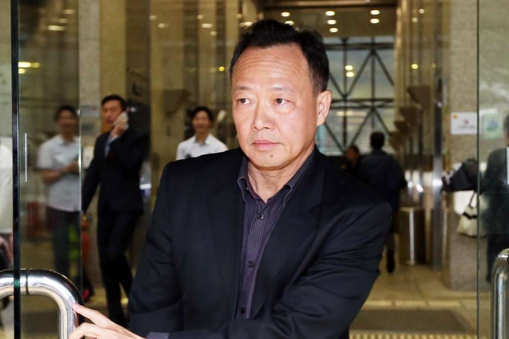 Assistant Director of Marine So Ping-chi leaves the District Court in Wan Chai. Photo: K. Y. Cheng