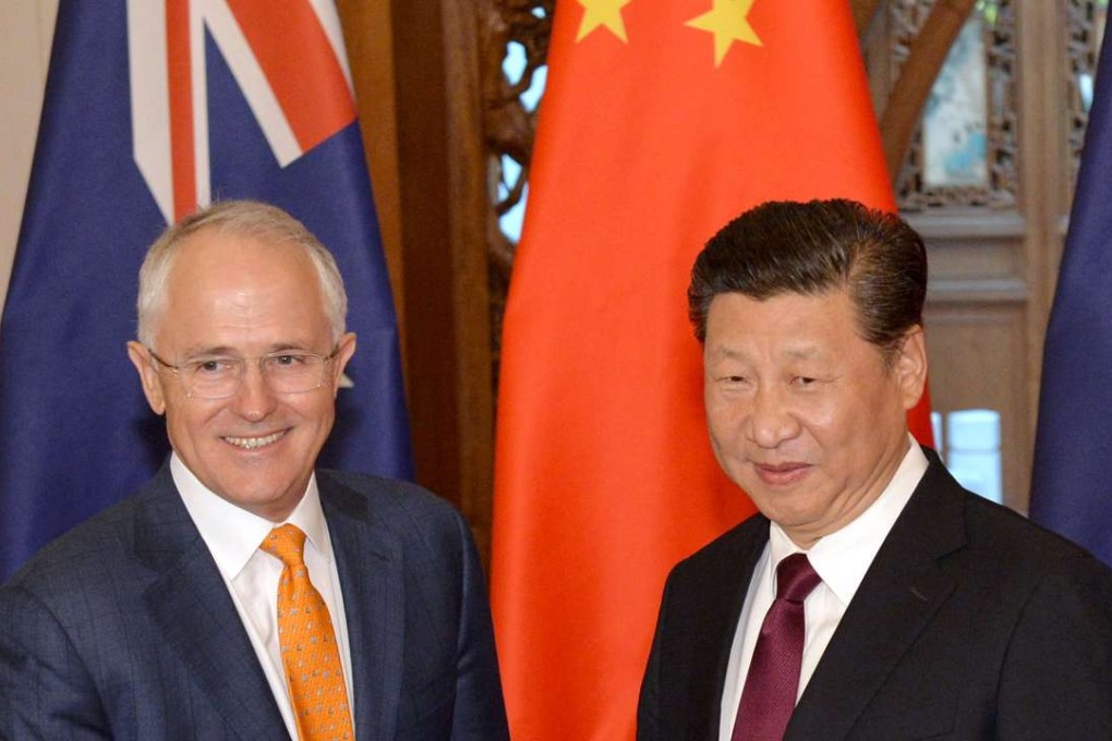 Australian Prime Minister Malcolm Turnbull and President Xi Jinping shake hands before a meeting at the Diaoyutai State Guesthouse in Beijing. Photo: Reuters