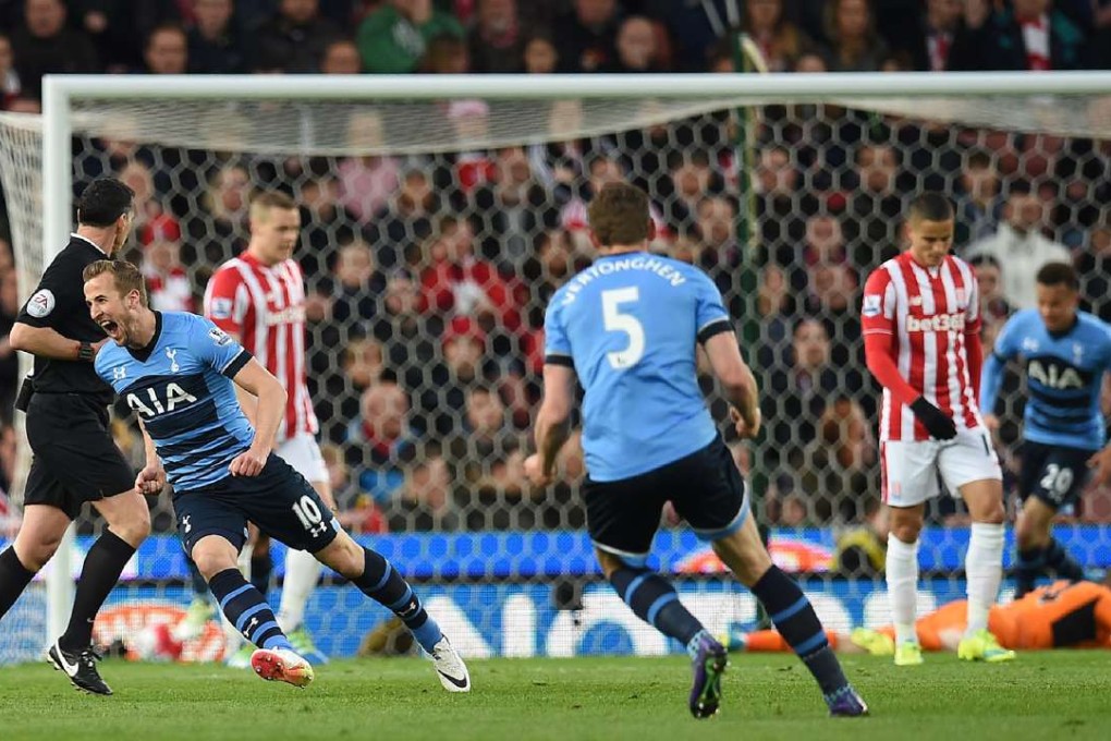 Tottenham Hotspur striker Harry Kane celebrates netting the opener for his team during their 4-0 win over Stoke City. Photo: AFP