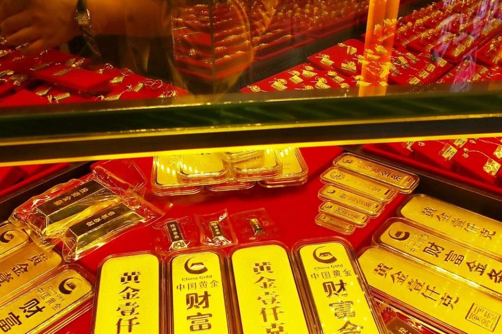 Gold bars are seen at a gold store in Yichang, Hubei province, China. Photo: REUTERS