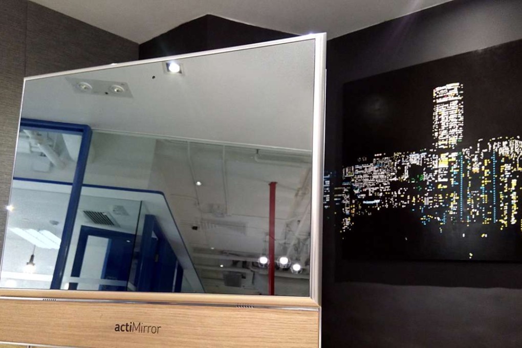 An actiMirror desktop mirror is a simple reflective surface before it is activated by movement. SCMP Pictures