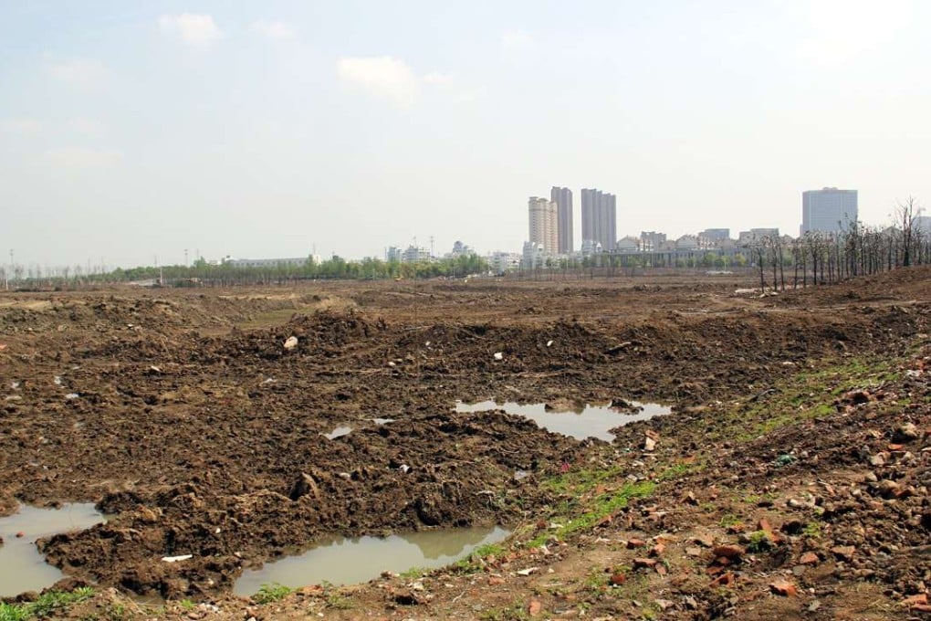 When the pupils moved into the new campus, the polluted soil was still exposed to the air and there were strong smells from the site. Photo: Imaginechina