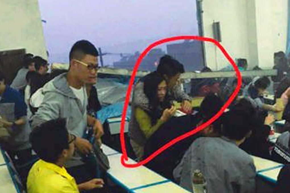 Please, let me protect you. No, I insist. A male student in Kunming throws his body in harm’s way to protect a female classmate. Photo: Metropolitan times