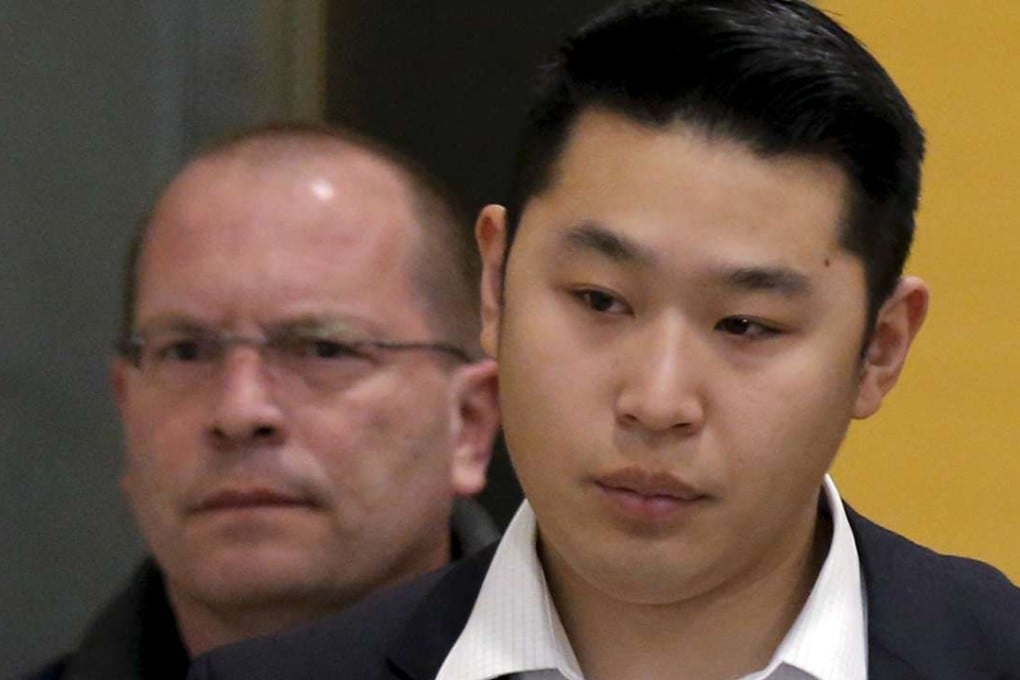 New York City Police officer Peter Liang is led from the court room at the Brooklyn Supreme court in New York. Liang was sentenced to no jail time after accidentally shooting an unarmed black man here. Photo: Reuters