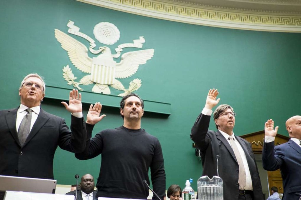 Bruce Sewell, Apple’s general counsel; Amit Yoran, president of RSA Security Inc; Matthew Blaze, associate professor of computer and information science, at the University of Pennsylvania; and Daniel Weitzner, director of MIT's Internet Policy Research Initiative, are sworn in at a House Energy and Commerce subcommittee hearing in Washington on Tuesday. Photo: Bloomberg