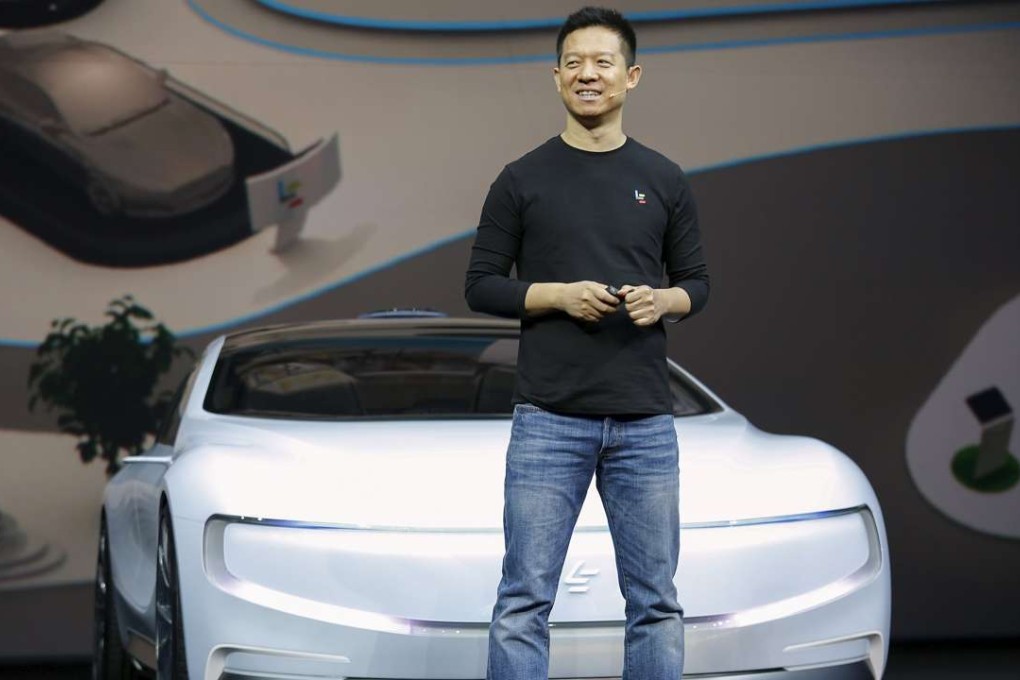 Jia Yueting, co-founder and head of Le Holdings, unveils an all-electric battery ’concept’ car called LeSEE in Beijing. Reuters