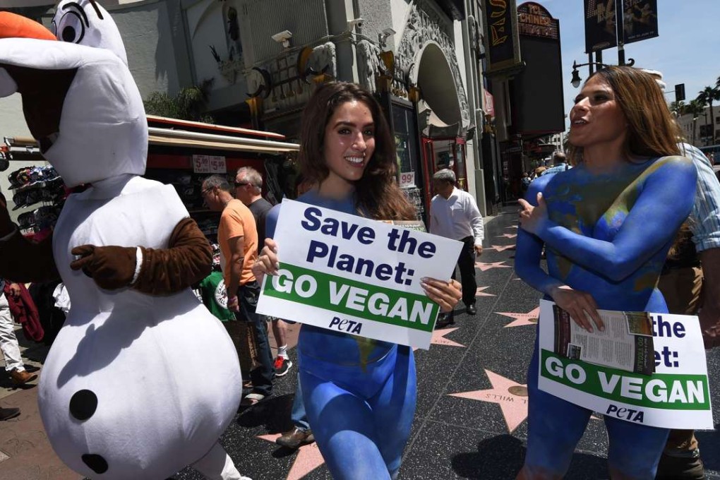 Peta campaigners deliver their Earth Day message this year, in Hollywood, California. Photo: AFP