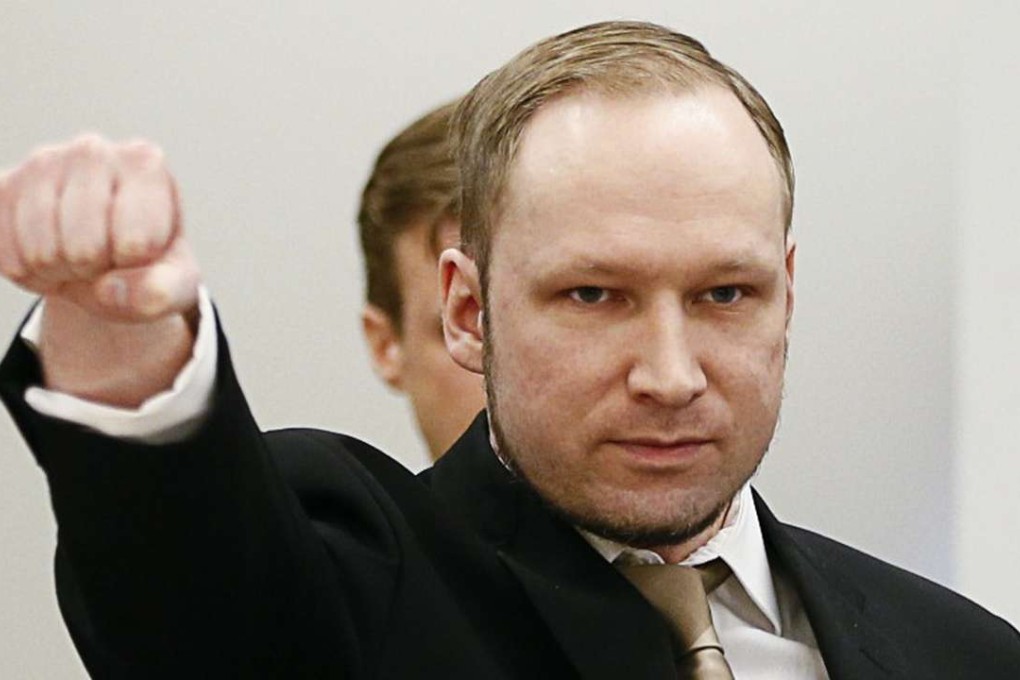 Norwegian mass killer Anders Behring Breivik raises his fist as he arrives to courtroom for the first day of his trial in Oslo, Norway, in 2012. Photo: Reuters