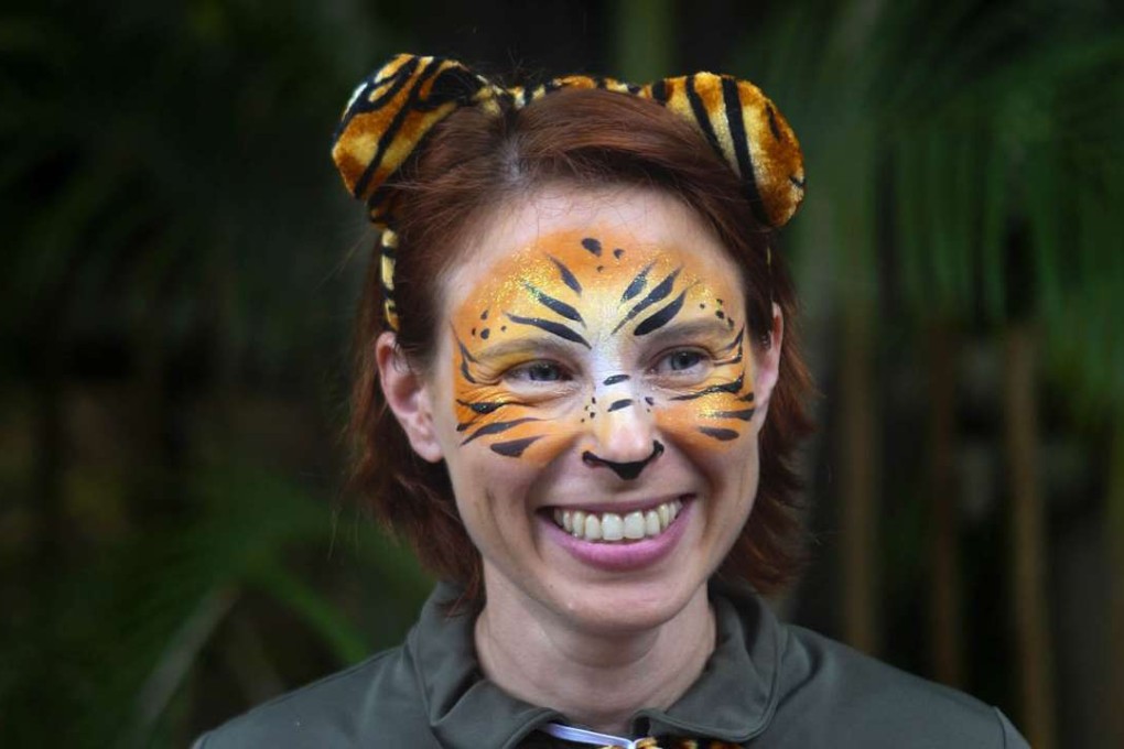 Stacey Konwiser smiles during the dedication of the new tiger habitat at the Palm Beach Zoo in West Palm Beach in March 2015. Konwiser was attacked and killed by a 13-year-old male tiger in an enclosure known as the night house, where tigers sleep and are fed. Photo: AP