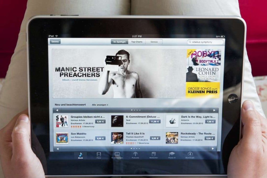 Electronic devices such as the iPad tablet facilitate the browsing and buying of digital music online. Photo: Corbis